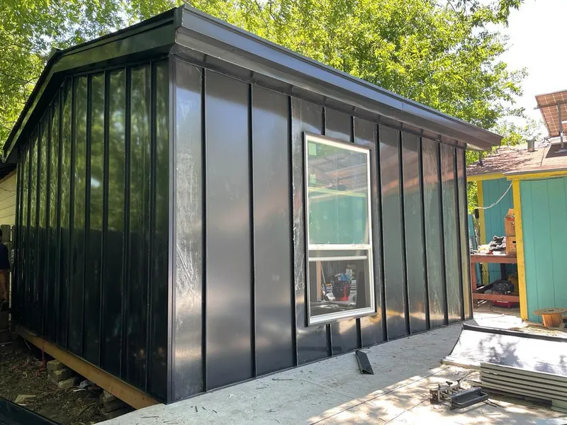 Black standing seam metal wall panels for Roof Inspection in Long Beach